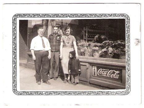 1938 -  Wilfred, Robert, Ella, and X - the store at Wade Park and 82nd that financed Wiegand's Lake.jpg